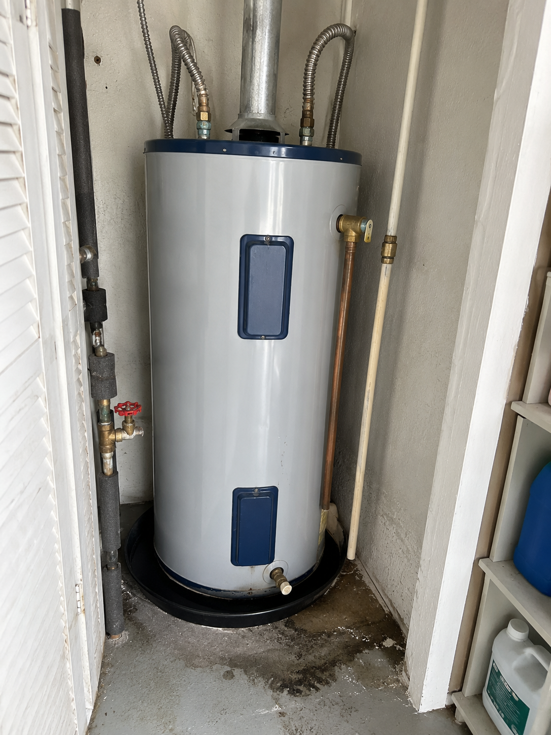 Emergency water heater repair in a Fort Lauderdale condo utility closet